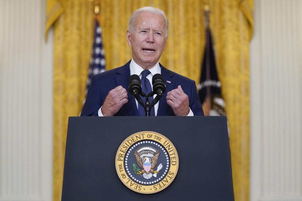President Joe Biden speaks about the bombings at the Kabul airport that killed at least 12 U.S. service members, from the East Room of the White House, Thursday, Aug. 26, 2021, in Washington. (AP Photo/Evan Vucci)